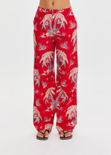 THE UPSIDE women's red Palma Sierra Wide Leg Pant features cream contrast panels, turquoise piping, soft elastic waistband, and side pockets. Perfect for travel or lifestyle.