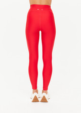 THE UPSIDE women's red eco tech Oxford 25-inch Legging is supportive and comfortable with cream side stripes and an elastic waist drawcord. Made for high impact.