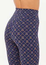 THE UPSIDE women's monogram jacquard Ezra 25inch High Midi Legging offers firm and supportive fit with V panel waistband. Made for yoga and pilates.