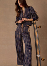 THE UPSIDE women's jacquard Ezra Nova Flare Pant features a monogram geometric design and an elasticated waistband with drawcord. Made for lifestyle.