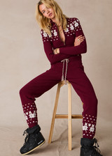 THE UPSIDE women’s maroon organic cotton Le Ski Jojo Knit Jogger features a soft knitted waistband with braided tassel drawcord, side pockets and snowflake design at ankles. Designed for Après-ski and winter wear.