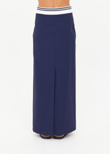 THE UPSIDE women’s navy Astra Zora Midi Skirt features a white and navy striped ribbed waistband with a centre back split. Made for lifestyle.