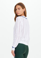 THE UPSIDE women’s white Citta Sonny V Neck Sweater is a fitted, chevron-knit design in organic cotton. The perfect wardrobe addition.