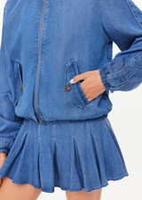 THE UPSIDE women’s blue denim Lykke Lexi Bomber Jacket, in a soft chambray fabrication, is made for a relaxed fit. This zip-through jacket features front pockets with branded tortoiseshell buttons.