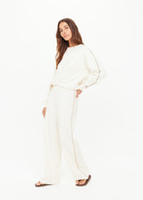 THE UPSIDE women’s creme cotton Hamsa Milou Wide Leg Pant features decorative contrast embroidery along side seams. The perfect travel pant.