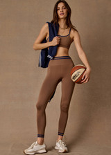 THE UPSIDE women’s recycled mocha Form Seamless 25In Legging offers a supportive fit with a soft ribbed waistband and moisture control. Made for yoga and pilates.