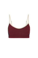 THE UPSIDE women’s maroon Adesa Scoop Danni Bra in recycled rib features scoop front and back necklines, removable cups, and soft elastic underbust. Made for high impact.