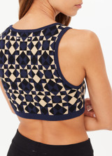 THE UPSIDE women's navy organic cotton Cosmo Alma Knit Crop Top is designed for a soft & comfortable fit and features a scoop neckline in our cosmo geometric print. Made for everyday wear.