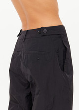 THE UPSIDE women's black recycled fabric Estelle Barrel Pant is designed for a boxy fit and features a structured waistband with belt loops and side seam pockets. Made for everyday.