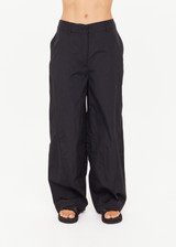 THE UPSIDE women's black recycled fabric Estelle Barrel Pant is designed for a boxy fit and features a structured waistband with belt loops and side seam pockets. Made for everyday.