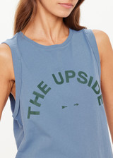 THE UPSIDE women’s denim organic cotton Jeet Tank Top has a relaxed fit with folded arm detail and a green logo at the front. Made for lifestyle.