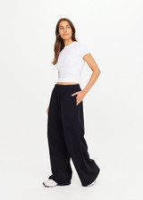 THE UPSIDE women's black recycled cotton Soho Tokio Wide Leg Pant is designed for a relaxed fit and features a soft encased elasticated waistband and wide leg. Made for lifestyle.