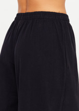 THE UPSIDE women's black recycled cotton Soho Tokio Wide Leg Pant is designed for a relaxed fit and features a soft encased elasticated waistband and wide leg. Made for lifestyle.