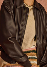 THE UPSIDE women's brown Zariah Bomber Jacket, made from soft vegan leather fabrication, is a regular fit and features a zip-through front and patch pockets. Made for lifestyle.