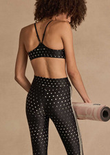 THE UPSIDE women's black Moonstone Zoe Bra offers a soft, supportive fit with a scooped low neckline, T-bar back, and adjustable elastic straps. Made for yoga & pilates.