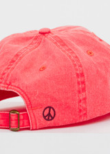 THE UPSIDE women's pink Soft Cap features a embroidered horseshoe logo on front and an adjustable strap at back with buckle. Made for lifestyle.