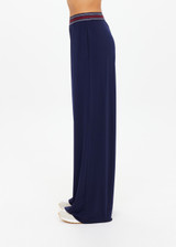 THE UPSIDE women's navy recycled polyester Harlan Wide-Leg Pant is designed for a true-to-size fit and features side-seam pockets and a striped elastic waistband. Made for lifestyle.