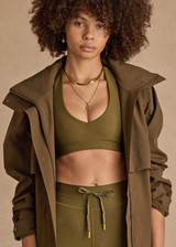 THE UPSIDE women's olive eco tech Oxford Ulla Halter Bra is designed for a supportive and comfortable fit and features a mid-coverage scoop halter. Made for performance.