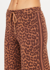 THE UPSIDE women's leopard organic cotton Malawi Freya Knit Pant is true-to-size and features a elasticated waistband with drawcord and short splits at hem. Made for everyday.
