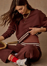 THE UPSIDE women's brown organic cotton Toluca Willow Wide Leg Pant is high-waisted and features a cream striped ribbed waistband and side seam pockets. Made for everyday.