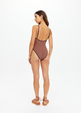 THE UPSIDE women's orange and navy check Solaris Flow One Piece features a scoop front neckline and low back with adjustable straps. Designed for swim.