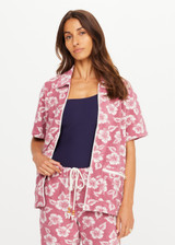 THE UPSIDE women's pink floral organic cotton Lahaina Cabana Zip Shirt features front patch pockets with zippers. Made for lifestyle.