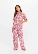 THE UPSIDE women's pink floral organic cotton Lahaina Cabana Zip Shirt features front patch pockets with zippers. Made for lifestyle.