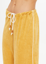 THE UPSIDE women's yellow terry towelling Cocos Charli Drawstring Pant has a low-rise straight leg fit with a soft elasticated waistband with drawcord. Perfect for everyday or holiday.