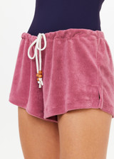 THE UPSIDE women's pink terry towelling Cocos Lucie Drawstring Short has a low-rise cheeky fit with a soft elasticated waistband with a drawcord. Perfect for holiday.