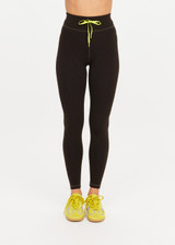THE UPSIDE women's olive jacquard Castilla 25 Inch Midi Pant is designed for a soft and comfortable fit and features mid-rise with lime elastic drawcord. Made for yoga and pilates.