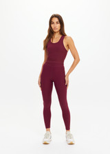 THE UPSIDE women's maroon recycled peached Sophie Crop Top is designed for a soft and supportive fit and features a racerback longline bra with internal shelf bra. Made for yoga and pilates.
