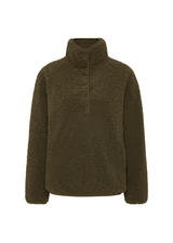 THE UPSIDE women's green recycled polyester Harlow Fleece Pullover is designed for a relaxed fit and features a quarter snap button opening and zip pockets. Made for lifestyle.