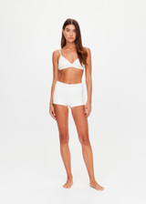 THE UPSIDE women's white Palais Rib Capri Bra is designed to be worn under sheer garments and features a v neckline with adjustable straps in a soft ribbed fabrication. Made for lifestyle.