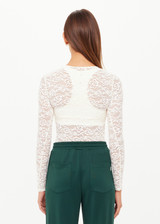THE UPSIDE women's cream Lyon Rosa Long Sleeve Top is a fitted, sheer lace style with a crew neckline. Made for everyday wear and layering.
