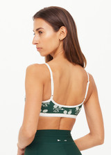 THE UPSIDE women's green Racquet Scoop Danni Bra features a contrast binded scoop neckline, adjustable straps and removable cups with a mini scallop trim at underbust. Made for tennis, golf & pickleball.