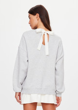 THE UPSIDE women's grey organic cotton Racquet Coolum Crew is an oversized fit with small split at side hem and discreet side pockets. Made for tennis, golf & pickleball.