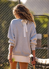 THE UPSIDE women's grey organic cotton Racquet Coolum Crew is an oversized fit with small split at side hem and discreet side pockets. Made for tennis, golf & pickleball.