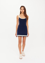 THE UPSIDE women's navy organic cotton blend Lori Knit Mini Dress features a scoop neckline with cream and lilac panels down sides and at hem. Made for tennis, golf & pickleball.