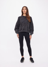 THE UPSIDE women's washed black Cosmic Paloma Crew is an oversized fit with a drop shoulder crafted from heavy organic cotton brushed fleece. Made for everyday.