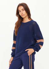 THE UPSIDE women's navy organic cotton Fenway Sebastian Crew offers a relaxed fit and features The Upside logo knit detail on back in tan. Made for lifestyle.
