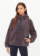 THE UPSIDE women's navy & camel Castilla Harlow Pullover is a relaxed pull over style fleece with raglan sleeves in our castilla "TU" design and features zip pockets, crafted from a recycled sherpa fabrication. Perfect for cooler weather.
