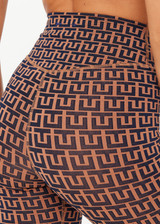 THE UPSIDE women's navy & camel recycled jacquard Castilla 25inch Legging is high-rise with a V panel waistband. Made for yoga & pilates.