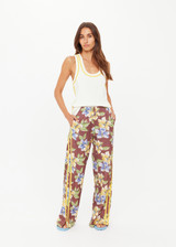 THE UPSIDE women's floral Isla Juliet Pant offers a relaxed fit in our vintage Isla hibiscus design and features an elasticated waistband with pockets, a split hem detail and yellow contrast binds. Made for lifestyle.