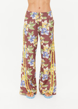 THE UPSIDE women's floral Isla Juliet Pant offers a relaxed fit in our vintage Isla hibiscus design and features an elasticated waistband with pockets, a split hem detail and yellow contrast binds. Made for lifestyle.