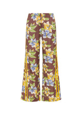 THE UPSIDE women's floral Isla Juliet Pant offers a relaxed fit in our vintage Isla hibiscus design and features an elasticated waistband with pockets, a split hem detail and yellow contrast binds. Made for lifestyle.