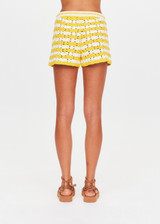 THE UPSIDE women's yellow organic cotton Goldie Malik Crochet Short is designed for a regular fit and features a hand crocheted flower design & an elasticated waist with tassel drawcord.