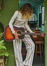 THE UPSIDE women's mocha stripe Baja Charli Drawstring Pant is designed for a low rise, straight leg fit with a elastic waistband with drawcord. Made for lifestyle.