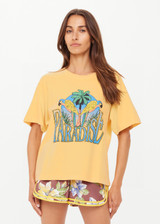 THE UPSIDE women's yellow organic cotton Paradise Jacob Tee is designed for an oversized fit and features a printed Paradise graphic on front. Made for everyday.