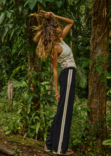 THE UPSIDE women's black Freya Knit Pant has a straight leg fit and features an elasticated waistband  and short splits at hem. Made for lifestyle.