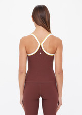 THE UPSIDE women's brown recycled rib Rhythm Caleb Tank Top features a shelf bra with removable cups and cream and yellow binds along neckline. Made for yoga & pilates.